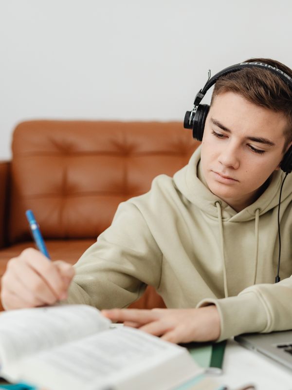 Student doing A-Level revision at a desk